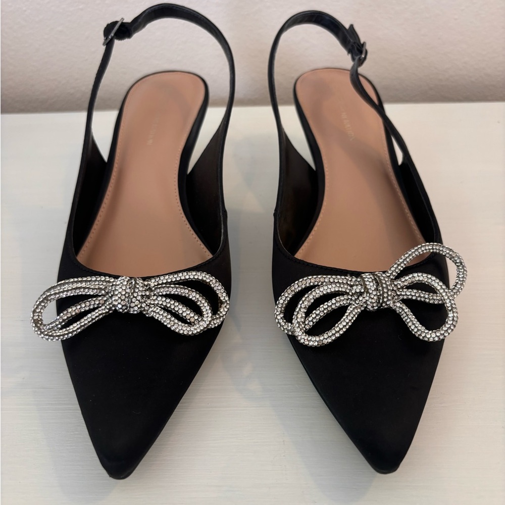 BCBGeneration Black Satin Heels with Pointed Toe and silver bow. Size 9
